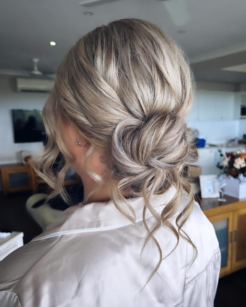 Low Bun with Loose Tendrils for women – nix_makeupandhair